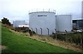 NJ4365 : Oil tanks by Richard Sutcliffe