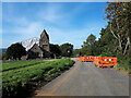 ST9367 : St Ann's Church under repair and road works by Vieve Forward