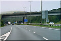 TR2238 : Canterbury Road crossing the A20 near Hawkinge by David Dixon