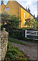 ST5789 : Yellow house, Main Road, Aust, South Gloucestershire by Jaggery