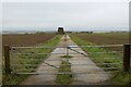 TL5543 : Concrete Farm Track on the Former RAF Walden Airfield by Chris Heaton
