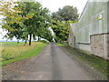 Minor road and farm buildings at Hilton