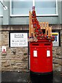 SE2233 : Remembrance display on a postbox in Pudsey by Stephen Craven