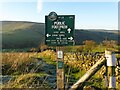SJ9879 : Footpath sign above Spout House Farm by Neil Theasby