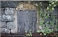 Old Milestone by A487, Llanfair-is-gaer, Parciau, opposite entrance to Griffins Industrial estate, below row of houses