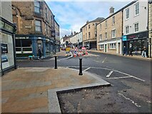 NY9363 : Work resumes - junction of Cattle Market and Eastgate by Oliver Dixon