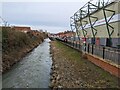 SK9770 : A fast flowing Sincil Dike in Lincoln by Richard Humphrey