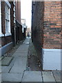 SJ4066 : Alley and benchmark in Abbey Square, Chester by John S Turner