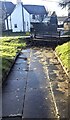 SO5512 : Churchyard path to a memorial bench, Staunton, Gloucestershire by Jaggery