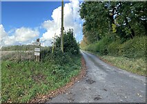 SU5651 : Private road to Home Farm Cottages by Mr Ignavy