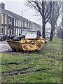 Yellow skip full of rubbish, Rockingham Terrace, Briton Ferry