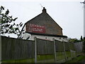 Old sign on a former store, Skegby