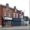 SJ9295 : Shops on Manchester Road by Gerald England
