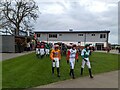 TL2072 : National Hunt jockeys walking to the parade ring at Huntingdon Racecourse by Richard Humphrey