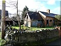 Outbuildings with old farm implements in Tregynon, Powys