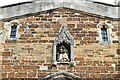 Wellingborough, All Hallows Church: Niched sculpture above the south porch door