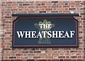 Sign for the Wheatsheaf public house, Weaverham