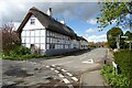 Timber-frame thatched cottage