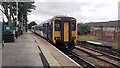 2-coach Class 156 diesel multiple unit departing south from Clitheroe Station