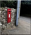 King George VI postbox in a stone wall, Cwmbach, Powys