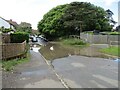 After  the  downpour  Old  Homes  Road  flooded