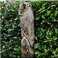 Smeeth: Owl carved from a tree stump using a chainsaw