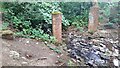 Piers of former bridge across Carr Beck in Bill Wood