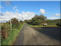 Llwybr yn gadael yr heol / Path exits the road