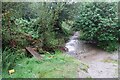 SX0454 : Flooded bridleway and a bridge by DS Pugh