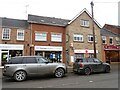 Charity shop and Post Office on Town Street, Duffield