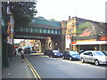 Twin railway bridges over Garratt Lane at Earlsfield Station.