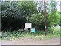 TQ5197 : Signs & rubbish, Curtis Mill Green, Essex by John Winfield