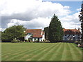 Houses on the green at Owlswick