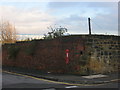 Two old walls and an old postbox. Low Walker