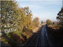 SJ7679 : View NE from Parkgate Lane Railway Bridge by Ian Warburton