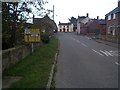 Obsolete road sign at Worthenbury