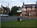 Signpost at Wrenbury by Nantwich Road/Station Road junction