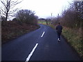 Runner on minor road, near Bardon Mill