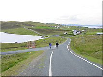 HU5562 : Walking across Whalsay on the road from Symbister to Isbister by Colin Park