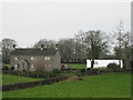 Rural dwelling with outbuilding.