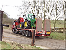SU9794 : Tractor on low loader, near Chalfont St Giles by David Hawgood
