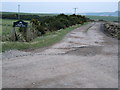 Dhurrie Farm road entrance.