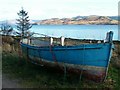 Blue boat on the shore