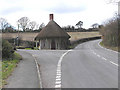 Old thatched toll house on A30 west of Chard