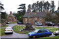 Green, war memorial and cottages, Litchborough