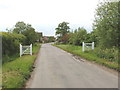 Gates as street furniture at entrance to Fencott