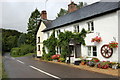 Cottages along the side of the (B3224) road at Luckwell Bridge