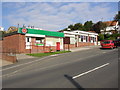 TA0585 : Row of shops and community centre, Osgodby by Humphrey Bolton