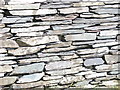 Dry stone wall composed of slate at Dolbadarn Castle