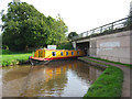 Narrowboat passes the A53 bridge, north east of Market Drayton